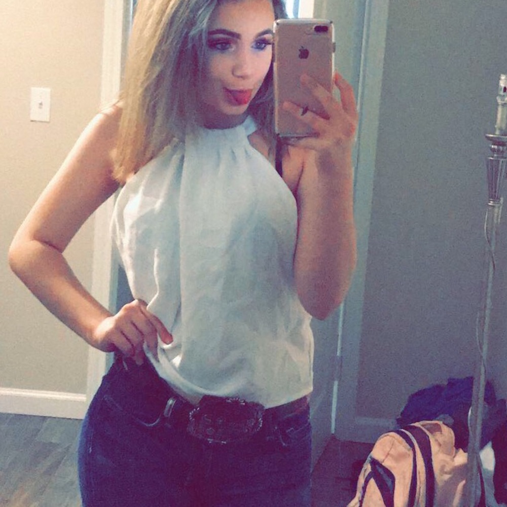 white shirt. no sleeves.